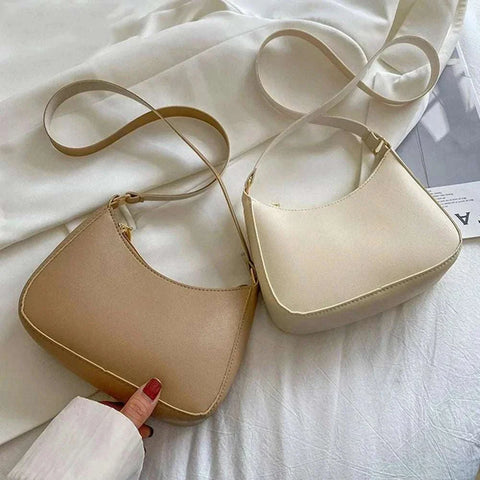 Retro PU leather shoulder bag in solid color, stylish underarm handbag for women.