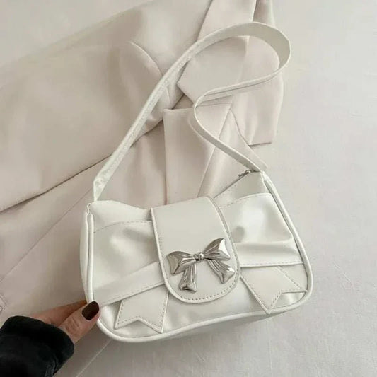 Trendy bow shoulder bag with structured underarm design for casual and professional use