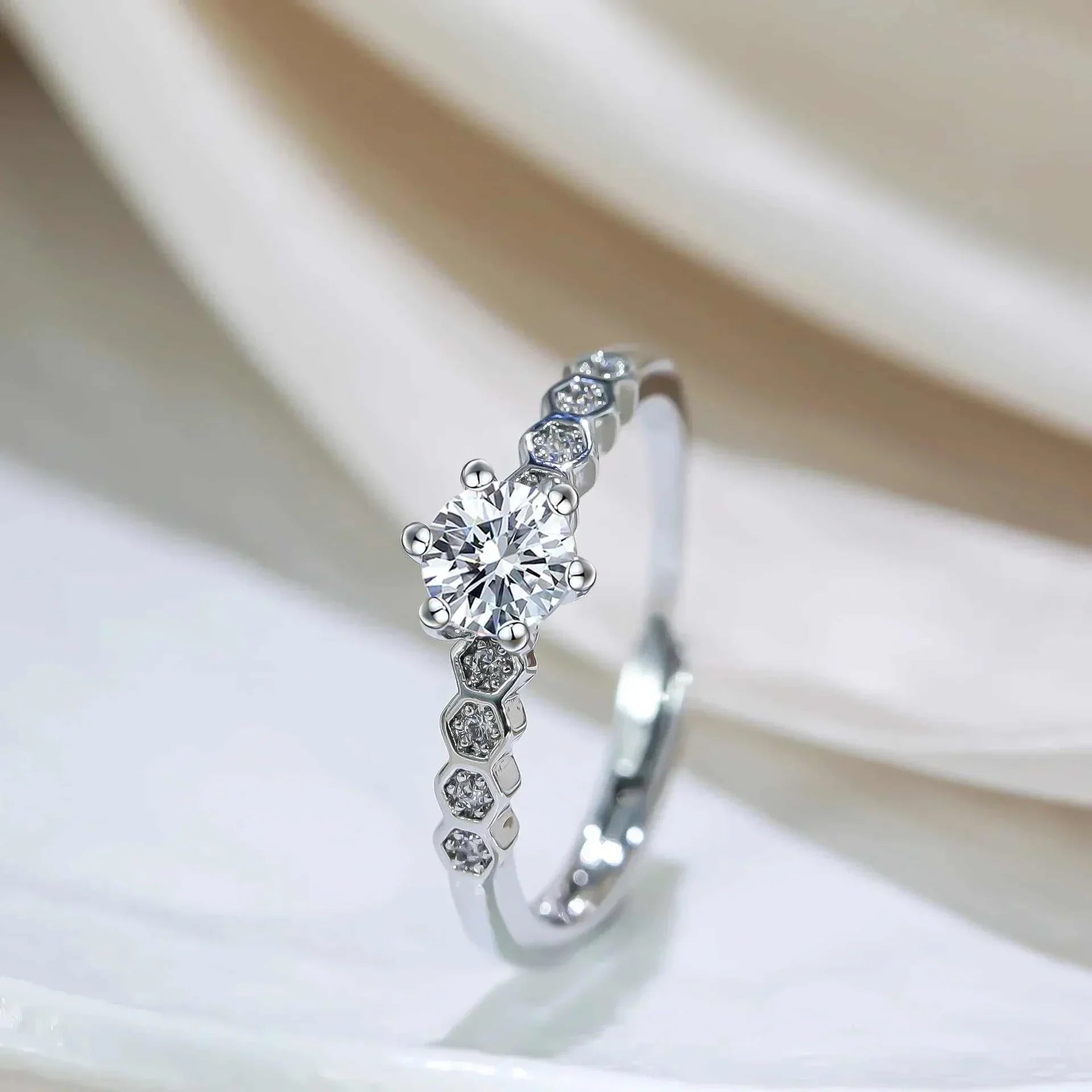 Silver 6-prong diamond ring with micro-pavé accents for engagements
