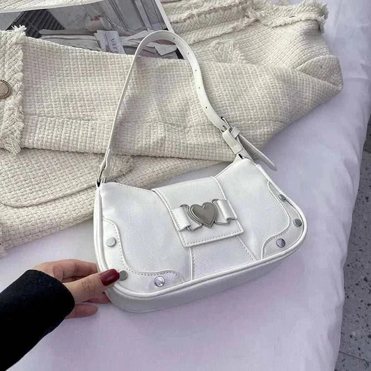 Trendy bow shoulder bag with structured underarm silhouette and elegant design